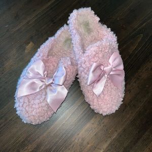 Pink fuzzy UGG slippers
